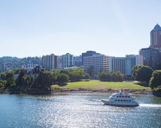 a boat in the river in the city