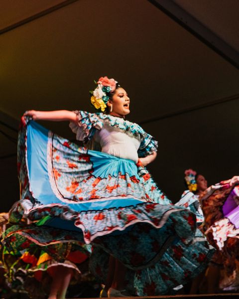 two people dancing on stage