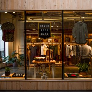 view from outside of clothing and shoes in window