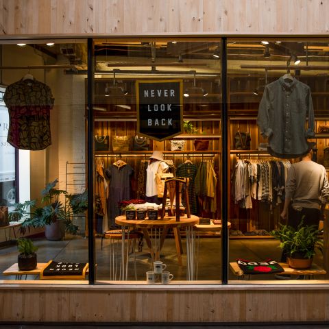 view from outside of clothing and shoes in window