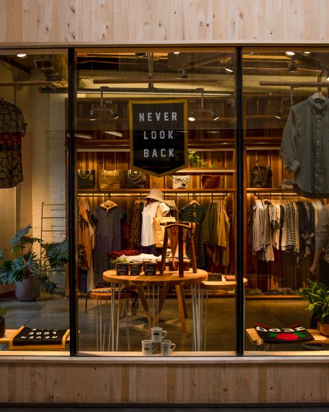 view from outside of clothing and shoes in window