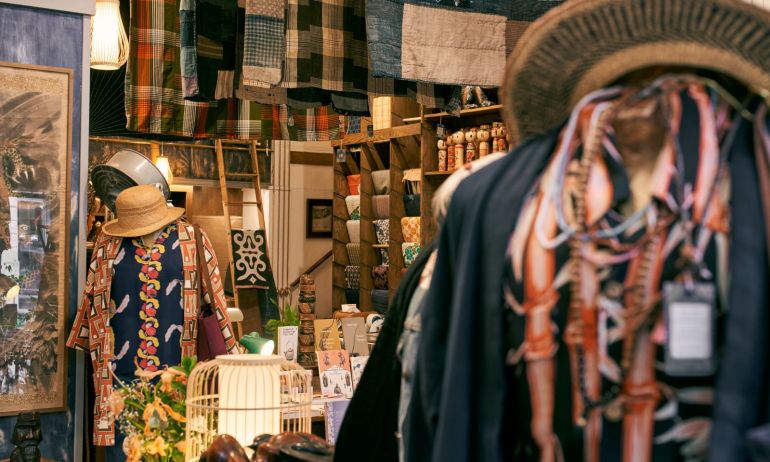 a shop display featuring apparel, fabric and homewares