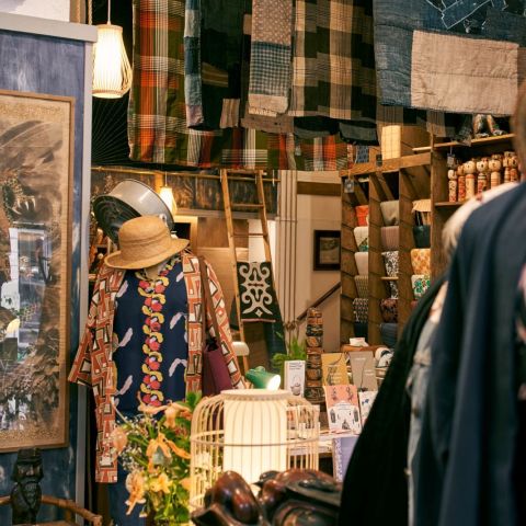 a shop display featuring apparel, fabric and homewares