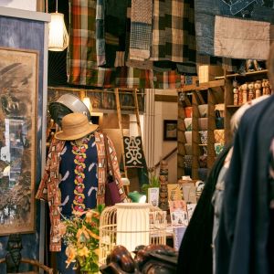 a shop display featuring apparel, fabric and homewares