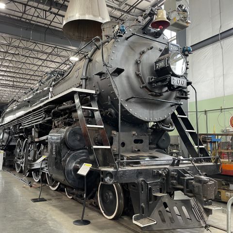 a steam locomotive inside a museum