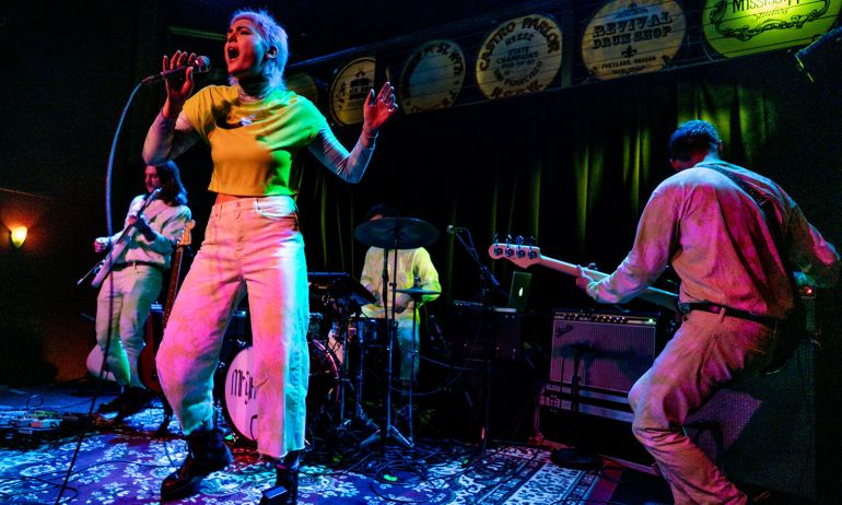 band and singer performing on stage