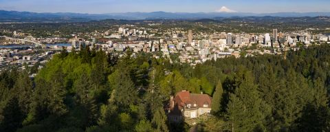 Aerial view of Pittock mansion and the Portland skyline