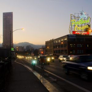 Giant lit-up neon Portland Oregon Stag sign has an added red Rudolph nose for the winter season