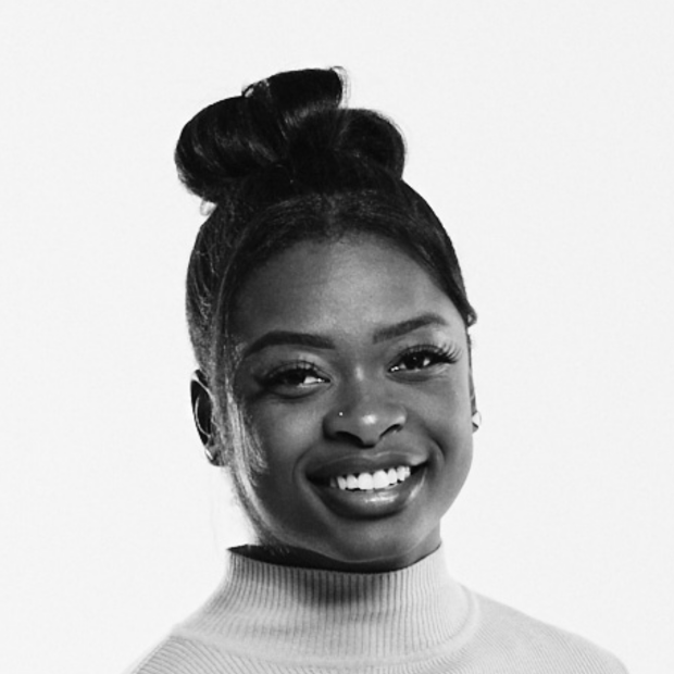 A black and white image of Victoria smiling, Content Manager at Travel Portland